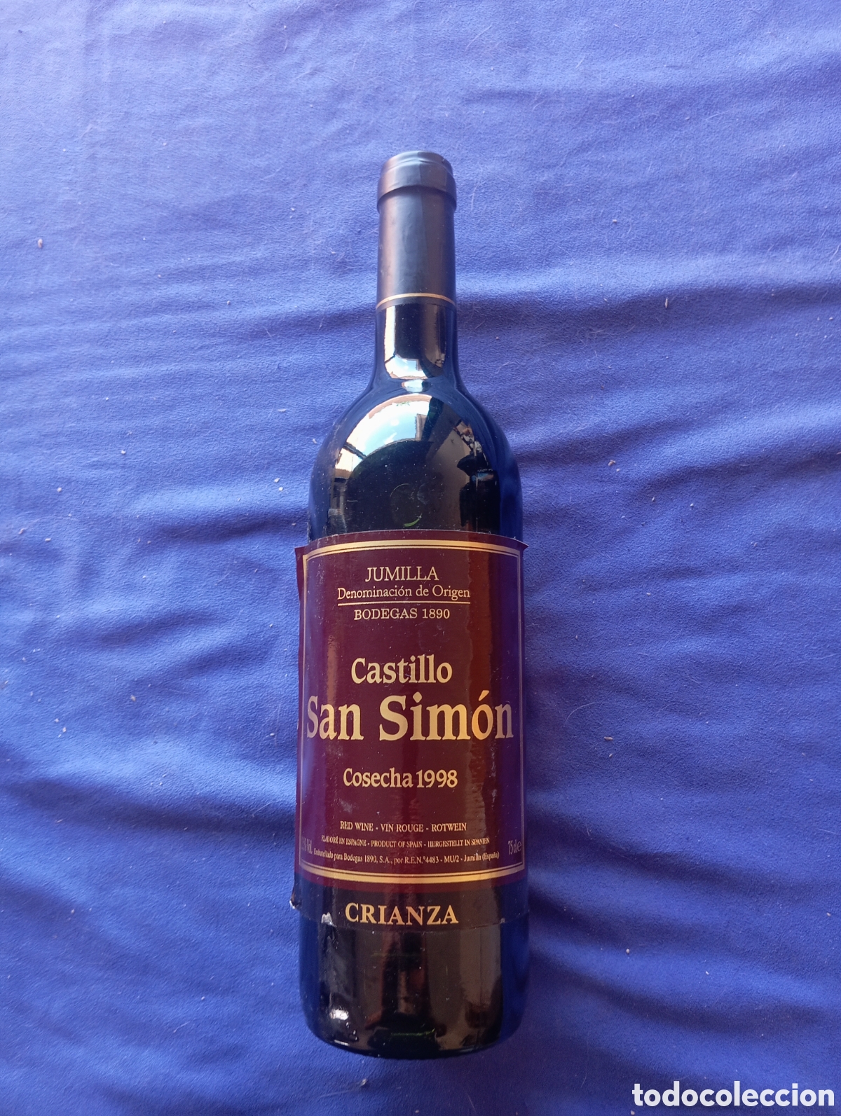 Antig&uuml;edades: Botella de vino castillo san simon cosecha 1998