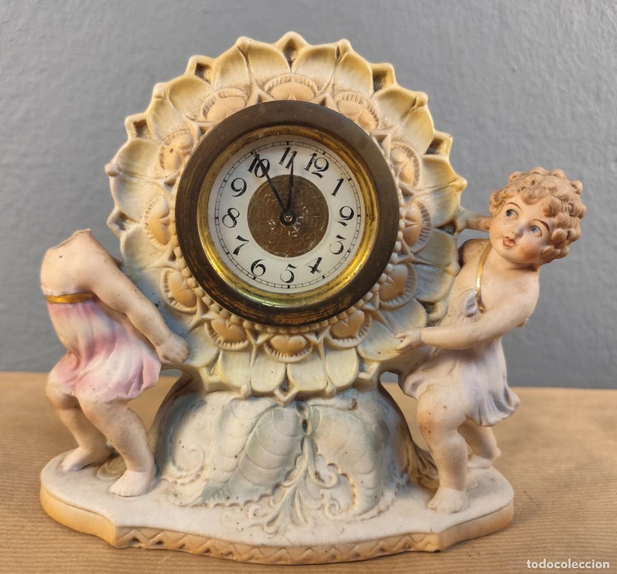 Antig&uuml;edades: Reloj decorativo con querubines &middot; porcelana biscuit