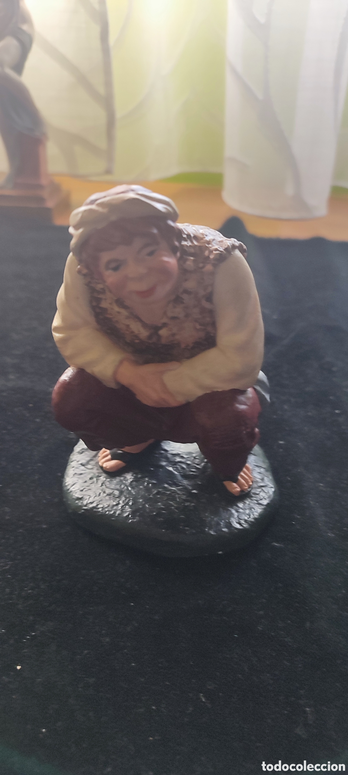 Antig&uuml;edades: Antigua figura de barro de un caganer de belen