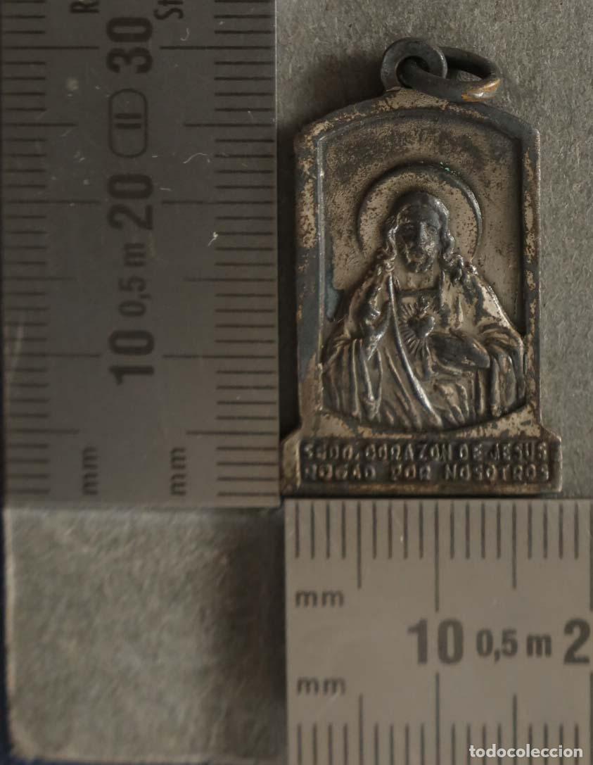 Antig&uuml;edades: MEDALLA. NTRA SRA DE GUADALUPE. BAENA. SAGRADO CORAZON. PLATA?