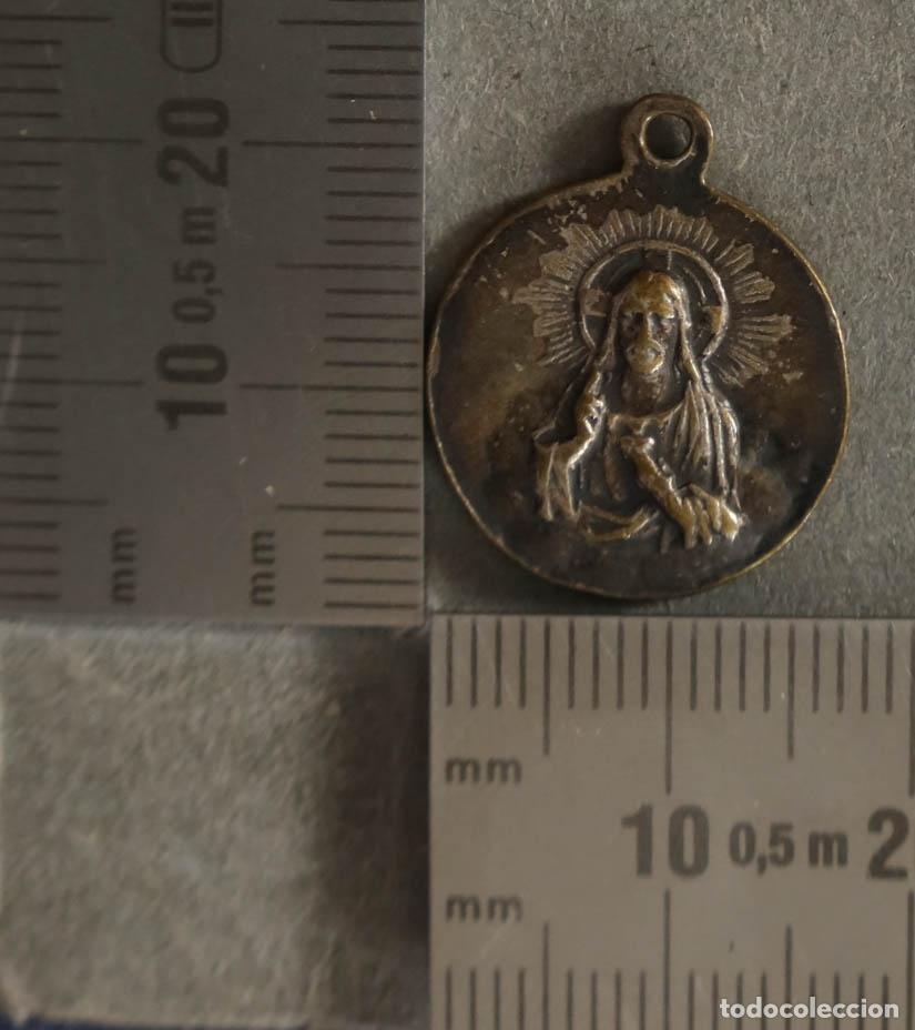 Antig&uuml;edades: MEDALLA. SAGRADO CORAZON. N S DE FATIMA.