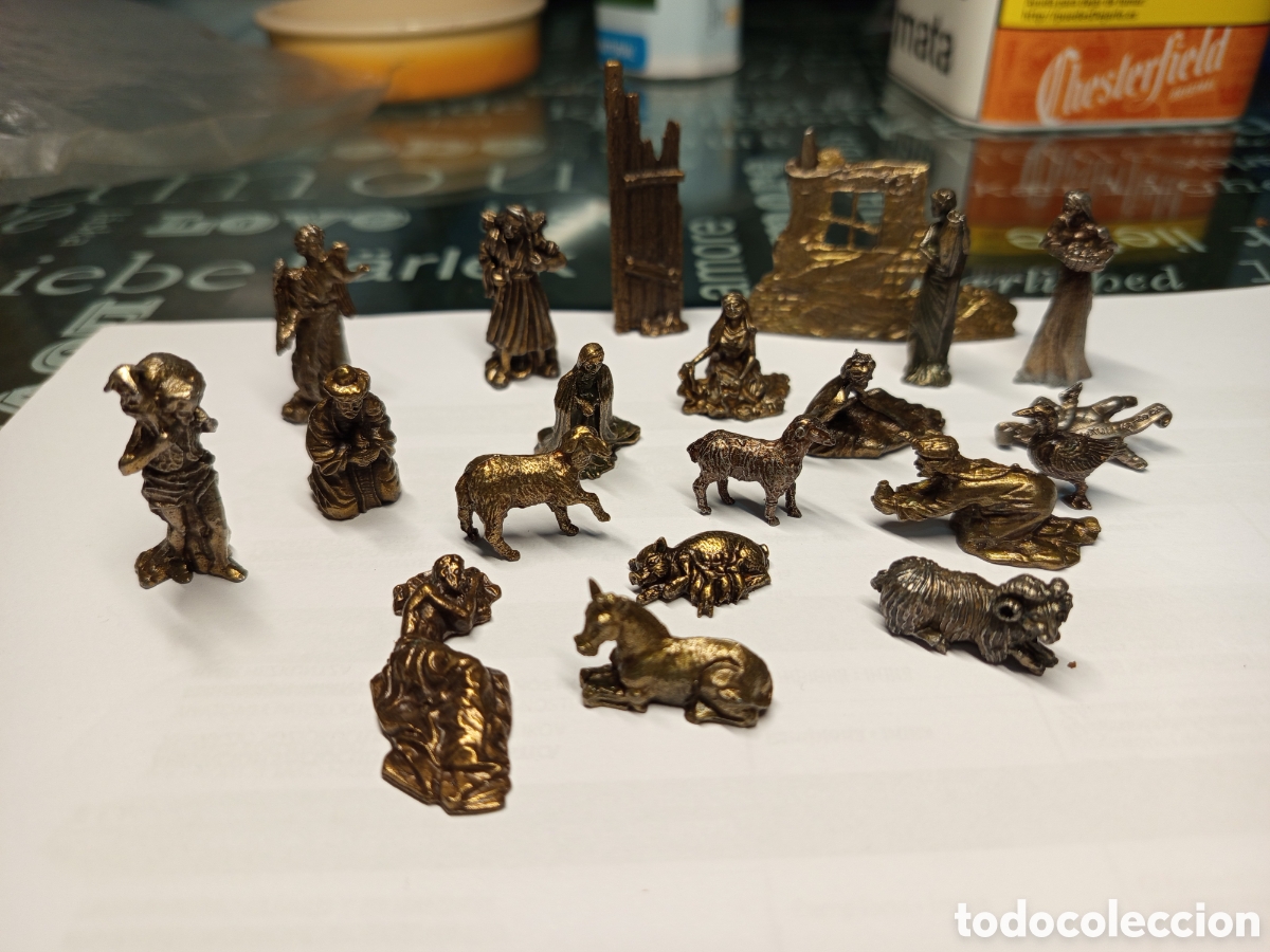 Antig&uuml;edades: 20 figuritas de bronce del Belen