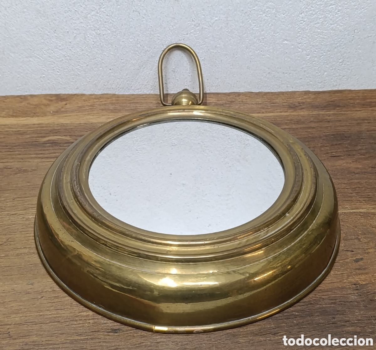 Antig&uuml;edades: ANTIGUO ESPEJO DE BRONCE O LAT&Oacute;N CON FORMA DE RELOJ DE BOLSILLO, A&Ntilde;OS 70.