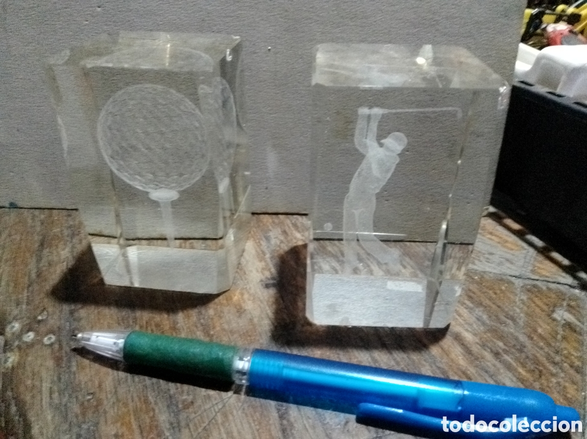 Antig&uuml;edades: Figuras de golf en cubos de cristal