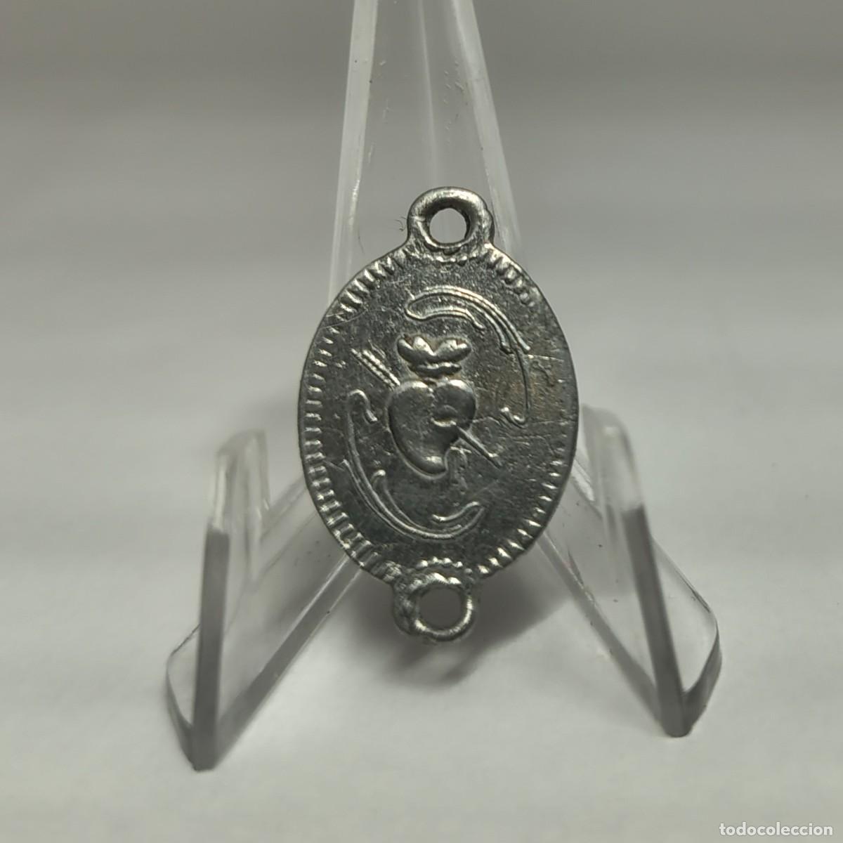 Antig&uuml;edades: Medalla religiosa / Colgante: Sagrado Coraz&oacute;n y VIRGEN. M311