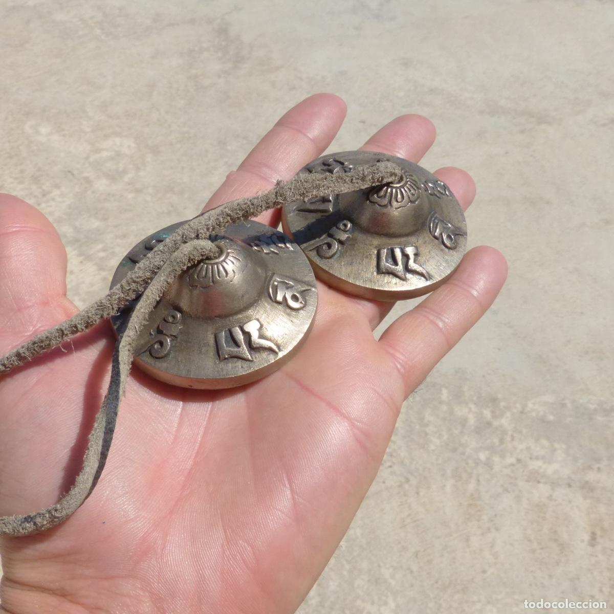 Antig&uuml;edades: Crotalos de bronce tibetanos, buen sonido, 5,7cm, 174gr.