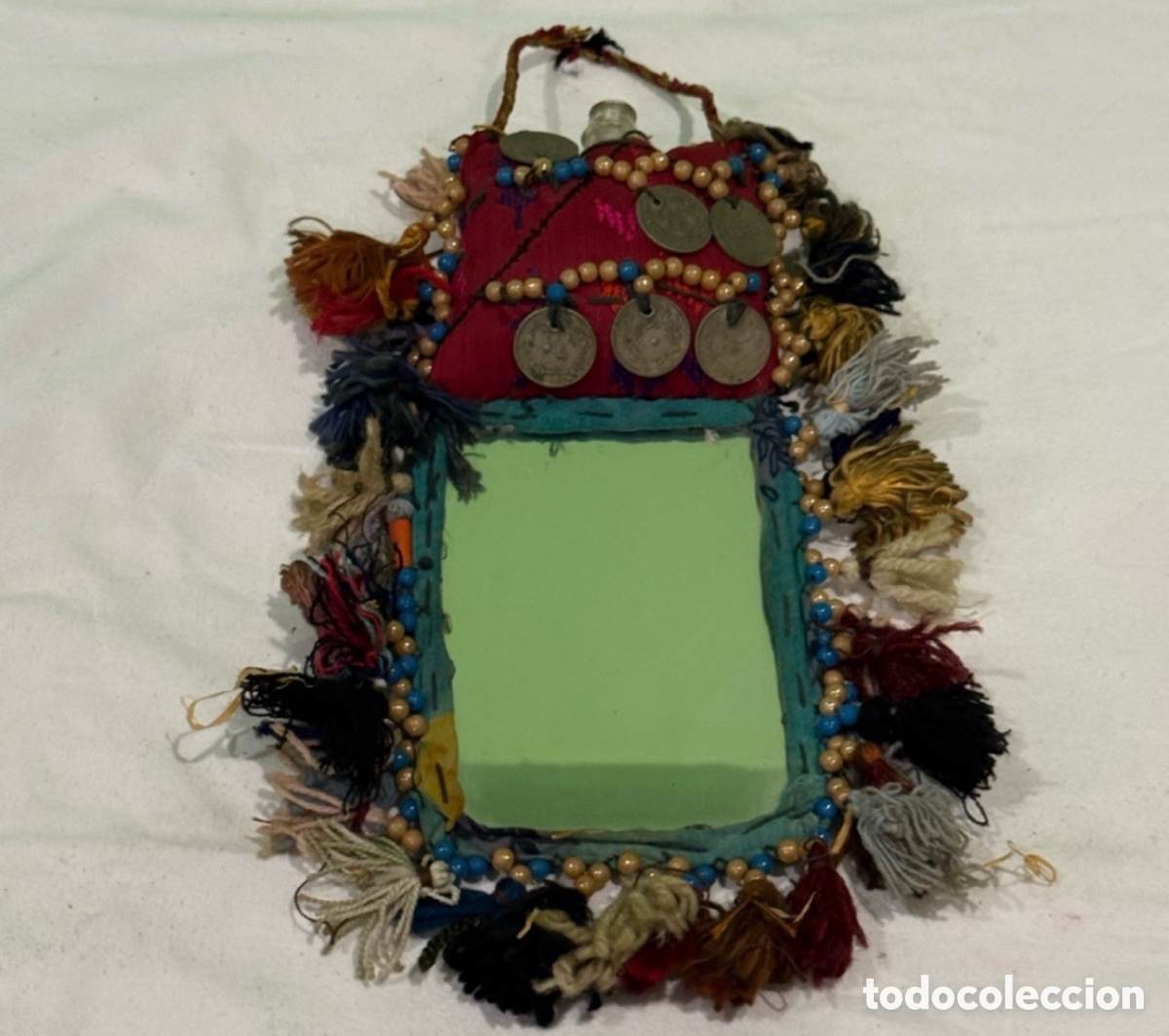 Antig&uuml;edades: Antiguo portaespejo y aplicador de kohl (delineador de ojos) otomano para novias siglo XIX.