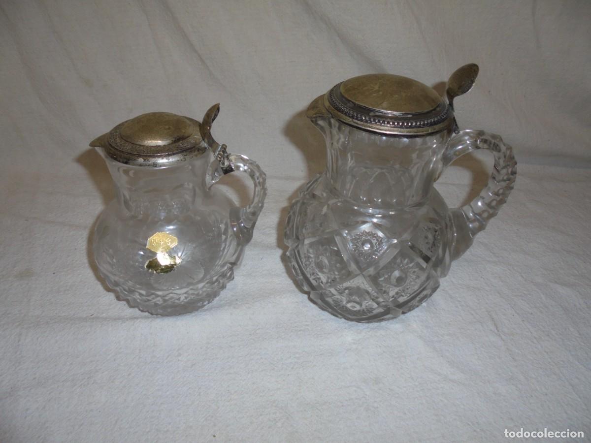 Antig&uuml;edades: magnificas dos jarras en cristal tallado y tapas en plata de ley