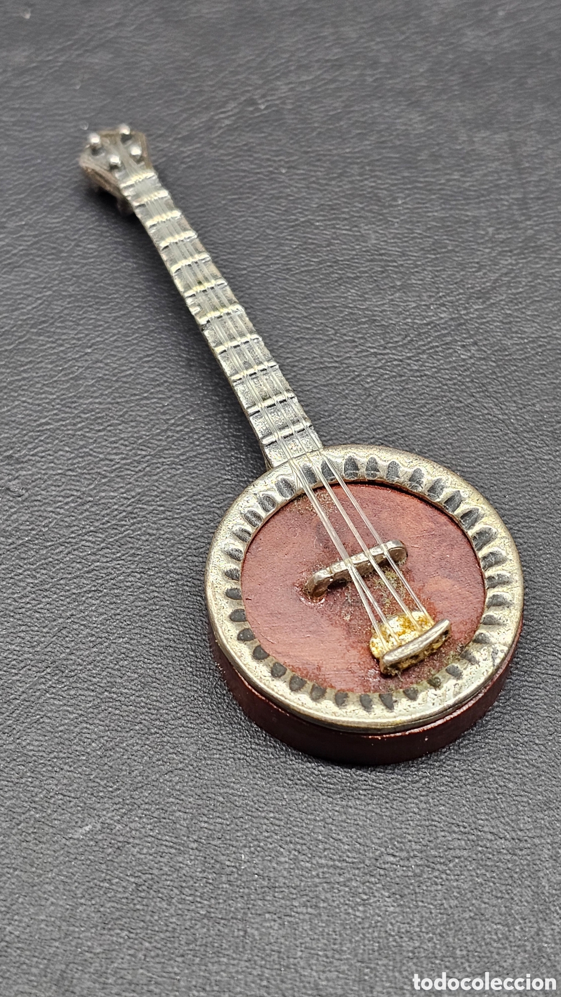 Antiques: Instrumento miniatura de plata de ley y madera de raiz