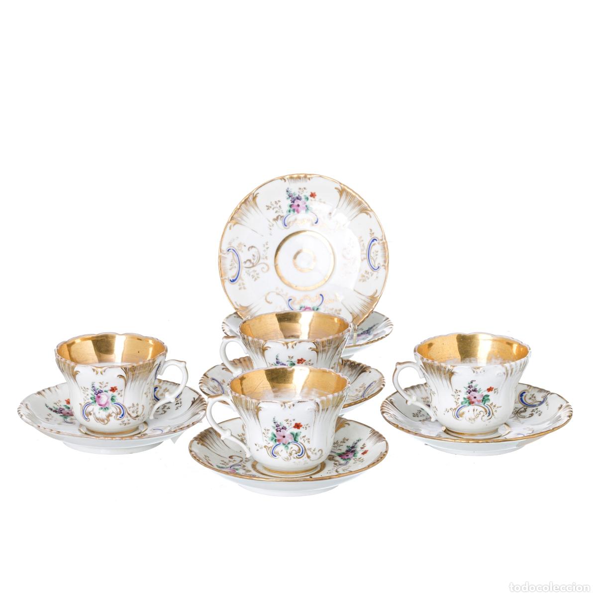Antiguidades: Porcelana - Juego de cuatro tazas y seis platillos