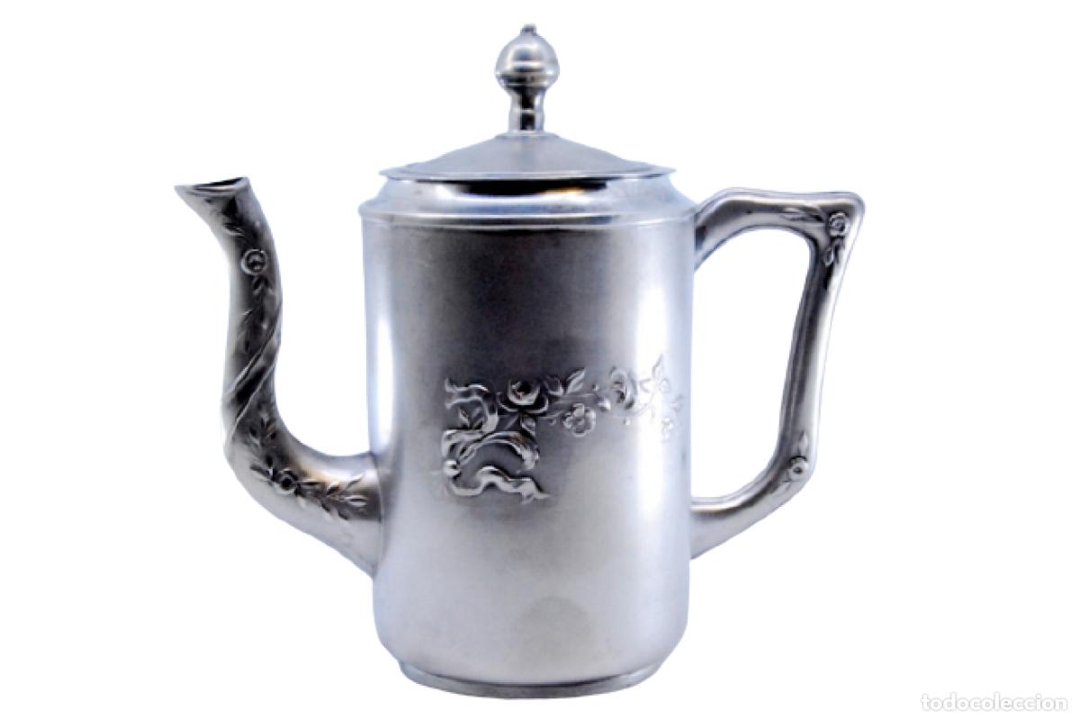 Antiquit&eacute;s: tetera de plata