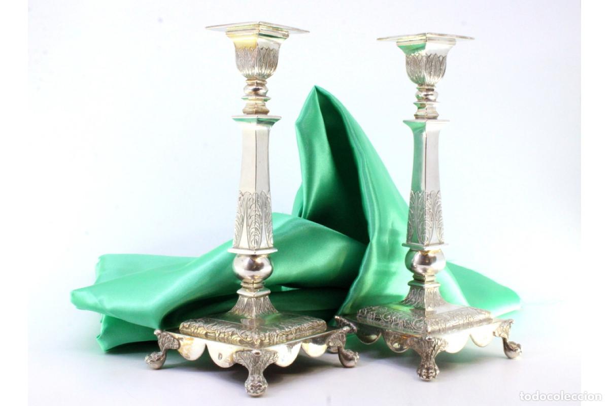 Antiguidades: candelabros de plata
