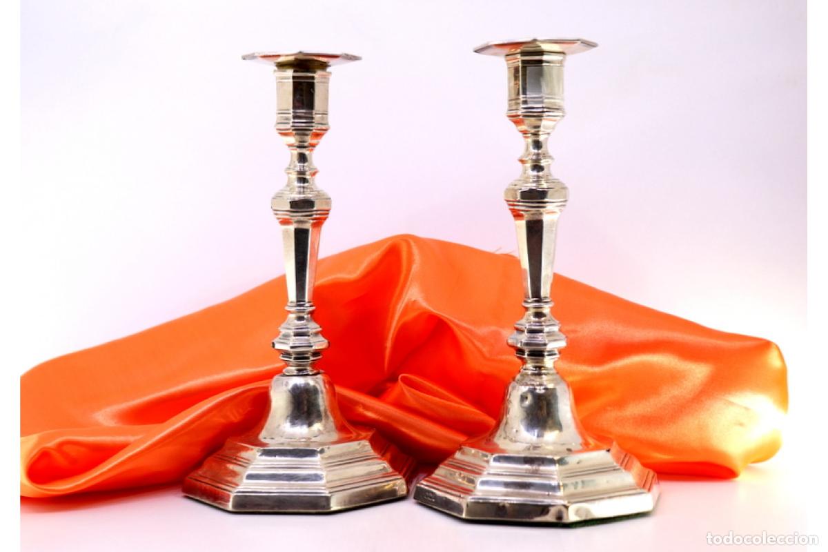 Antiguidades: candelabros de plata