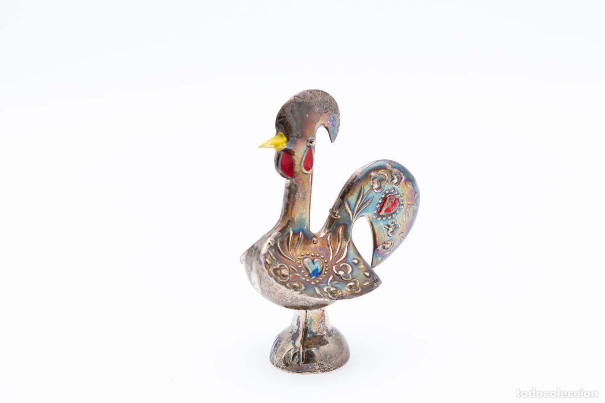 Antiguidades: gallo de plata