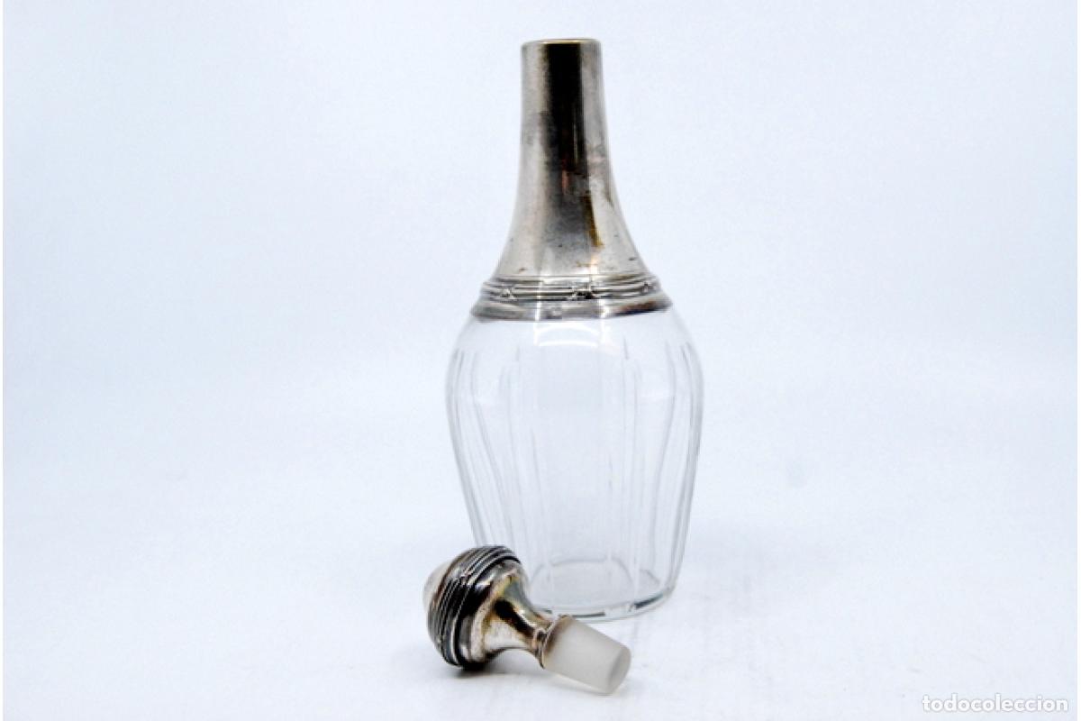 Antiques: Botella con plata
