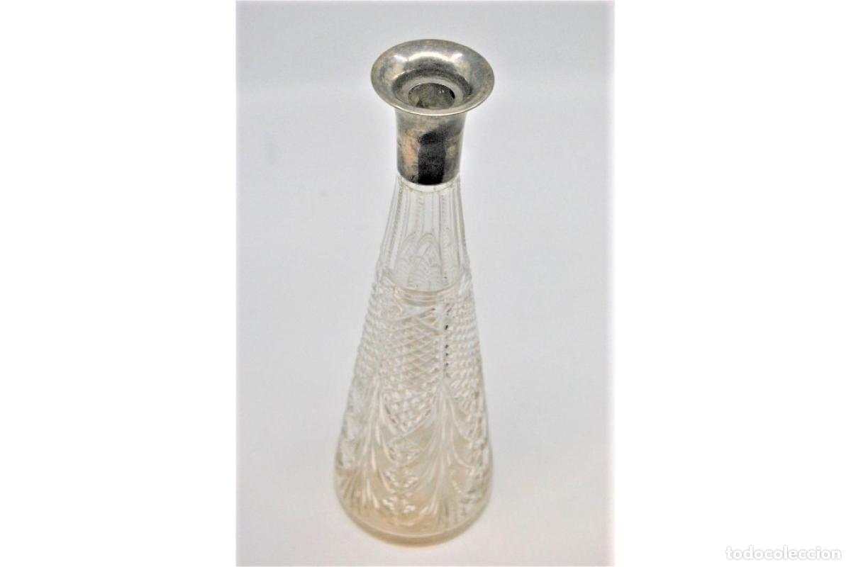 Antig&uuml;edades: Botella con plata