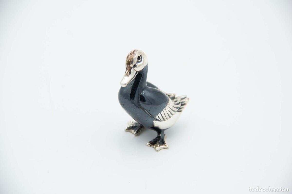 Antiguidades: Pato de plata