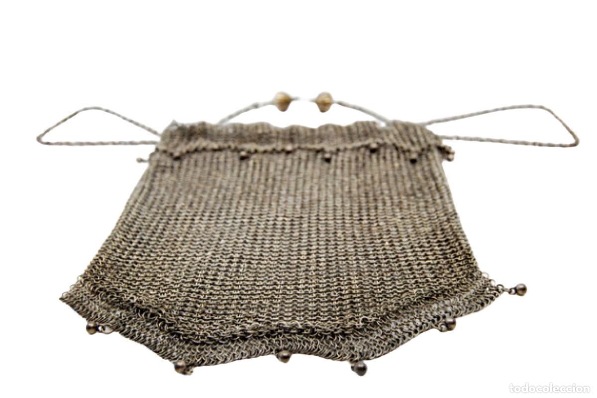 Antiguidades: bolsa de plata