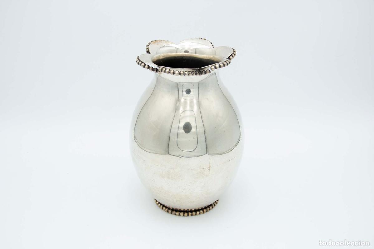 Antiques: jarra de plata