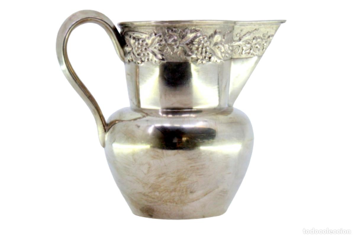 Antiques: Jarra de vino de plata