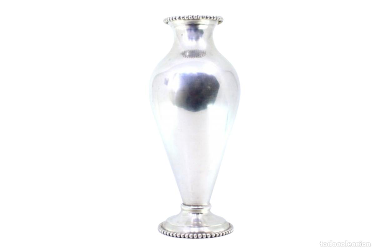 Antiques: jarra de plata