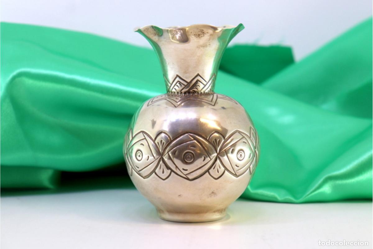 Antiguidades: jarra de plata