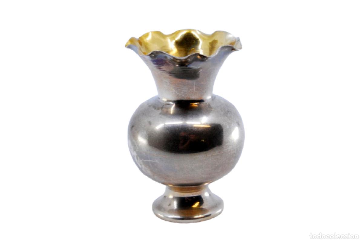 Antiguidades: jarra de plata