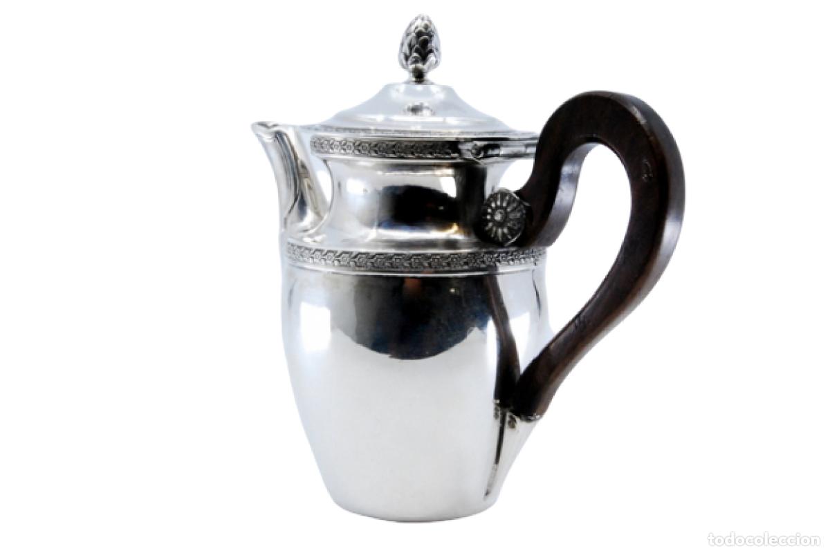 Antiques: tetera de plata