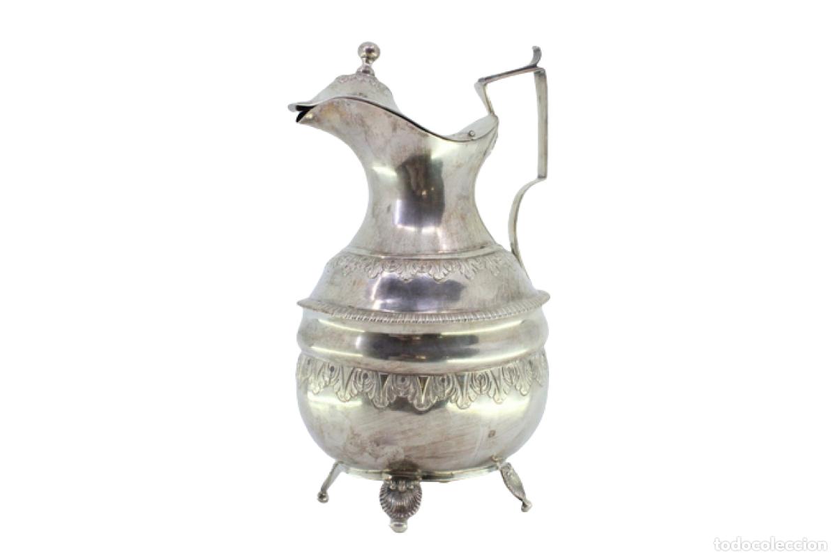 Antiques: jarra de leche de plata