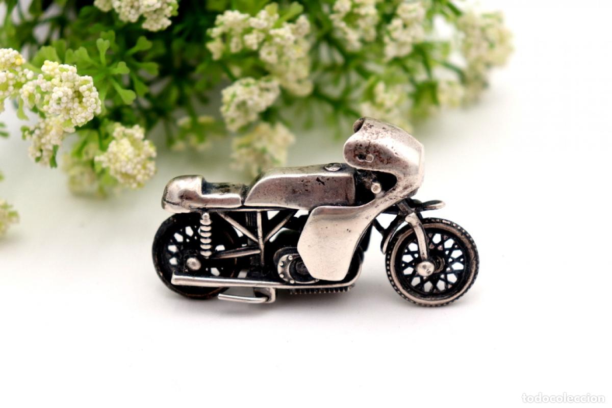 Antig&uuml;edades: Motocicleta articulada de plata - Foto 1