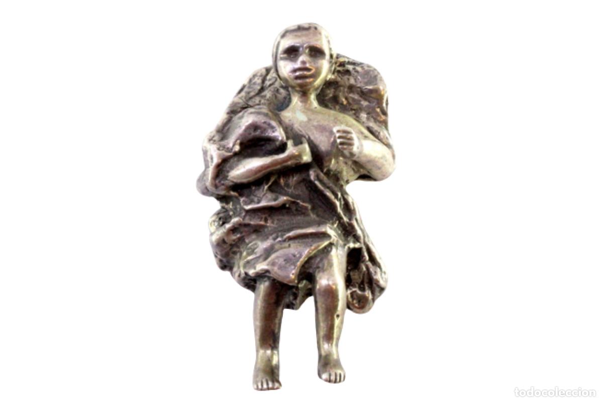 Antiquit&auml;ten: El Ni&ntilde;o Jes&uacute;s, acunado en una cuna de plata.