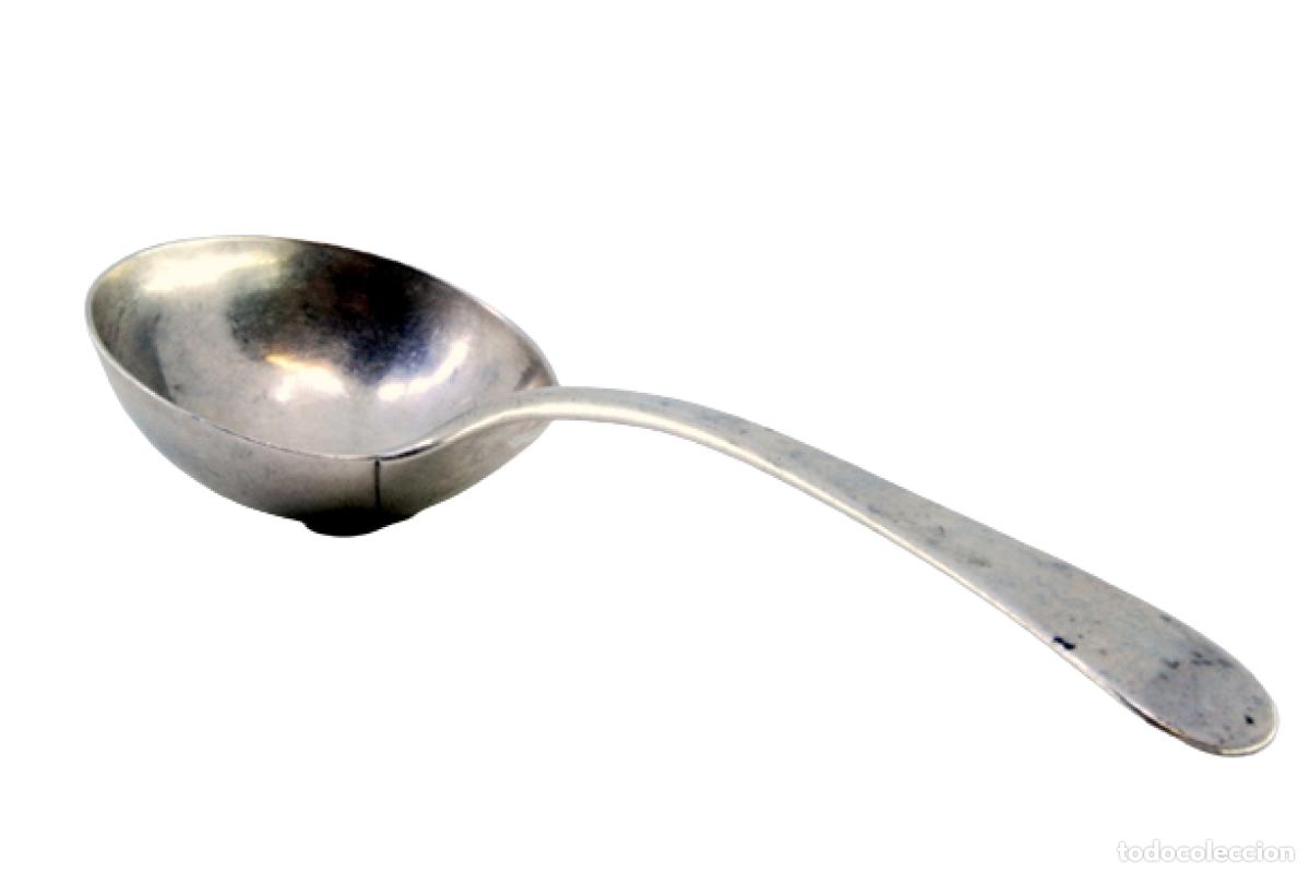 Antiques: cuchara de salsa de plata