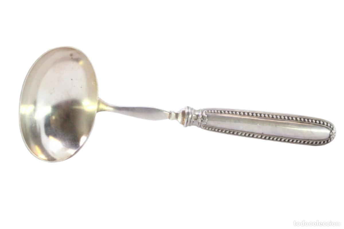 Antig&uuml;edades: cuchara de salsa de plata