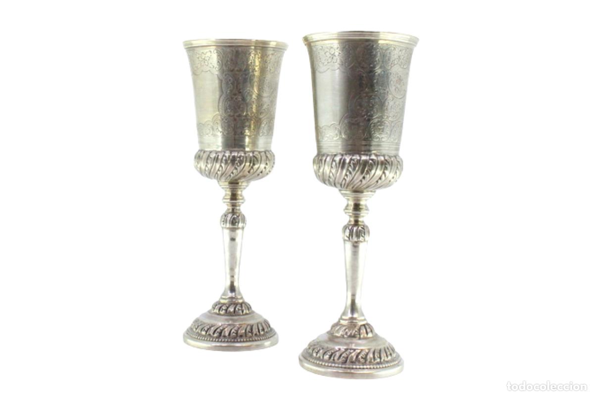 Antiques: Par de copas de plata