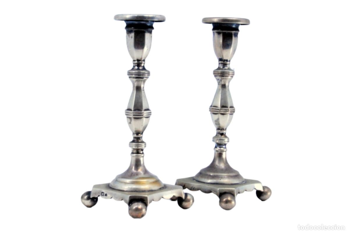 Antiguidades: candelabros de plata