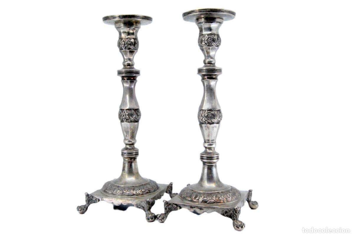 Antiques: candelabros de plata