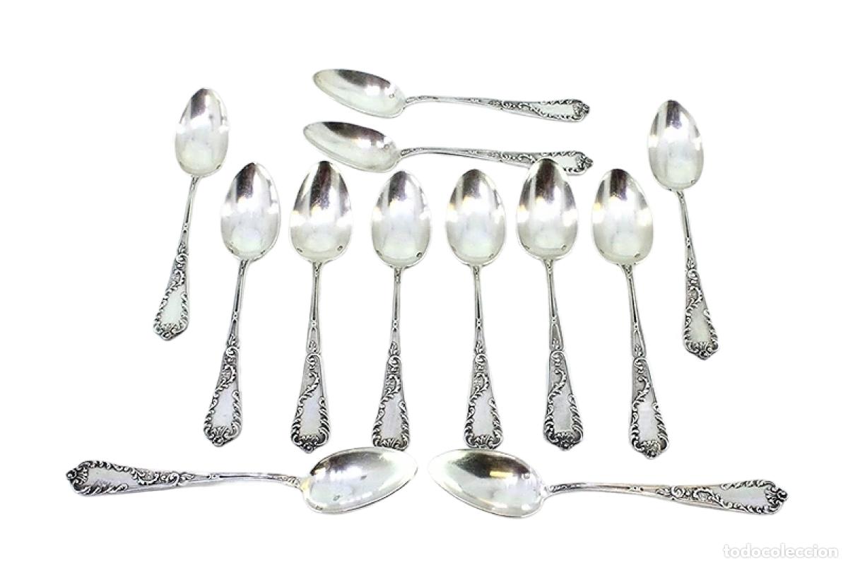 Antig&uuml;edades: Juego de 12 cucharas de postre de plata