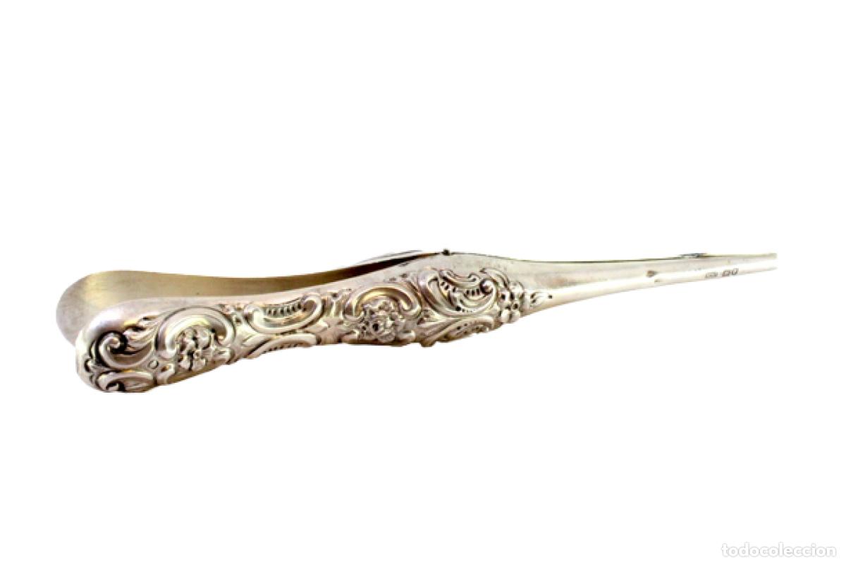 Antiques: Pinzas para estirar guantes, en color plata.