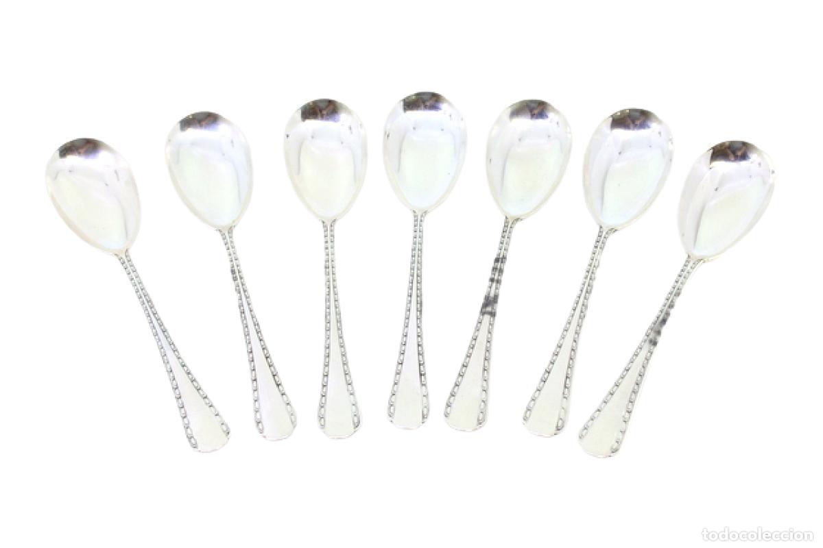 Antiquit&eacute;s: Juego de 7 cucharas de plata para helado.