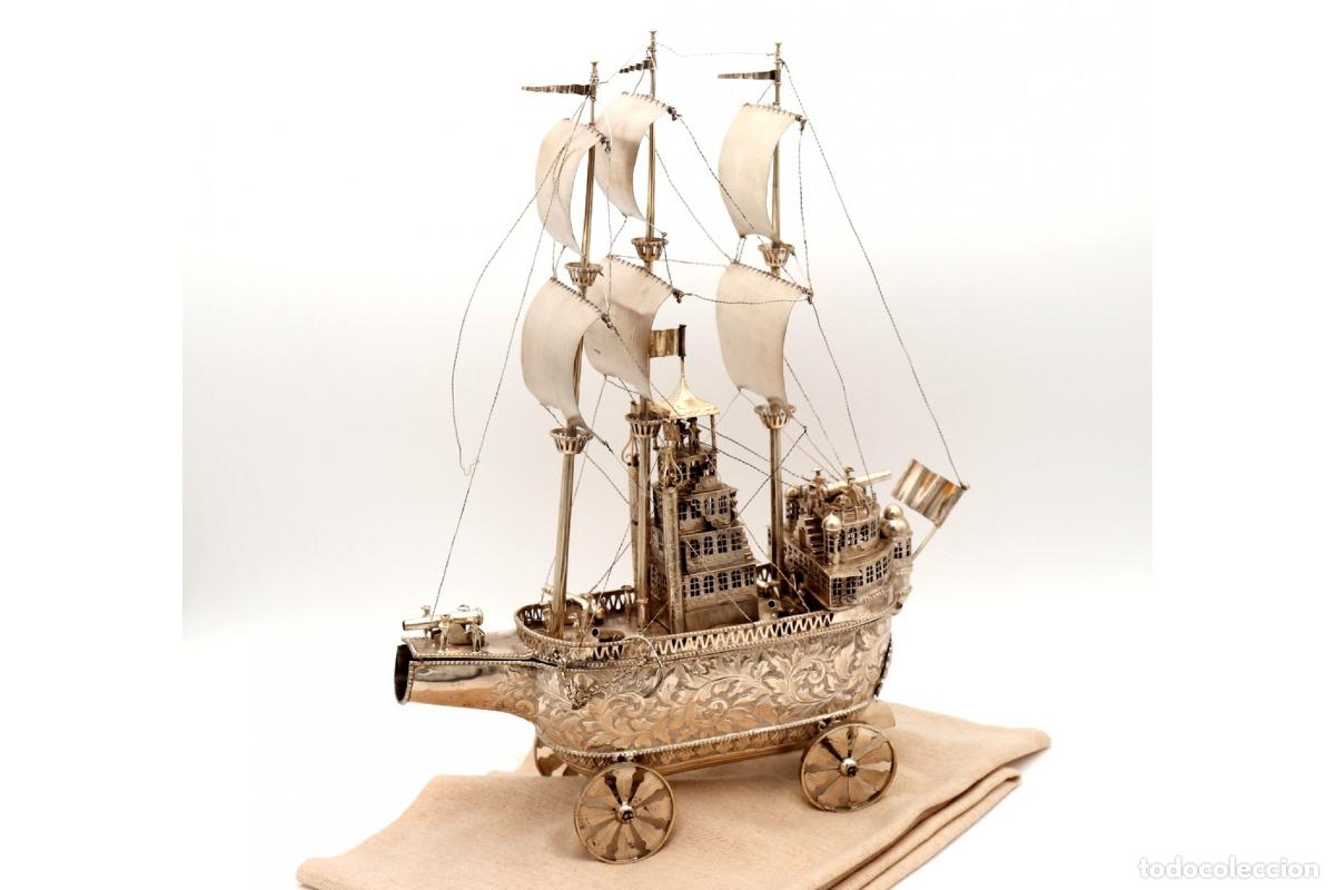 Antiques: Portabotellas, en color plata.
