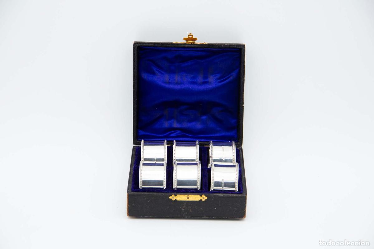 Antiquit&eacute;s: Juego de 6 servilleteros de plata con estuche original.