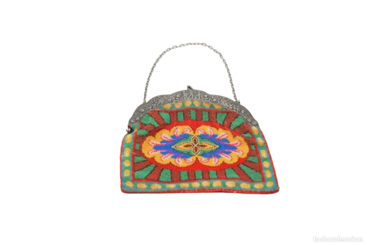 Antiques: bolsa de plata