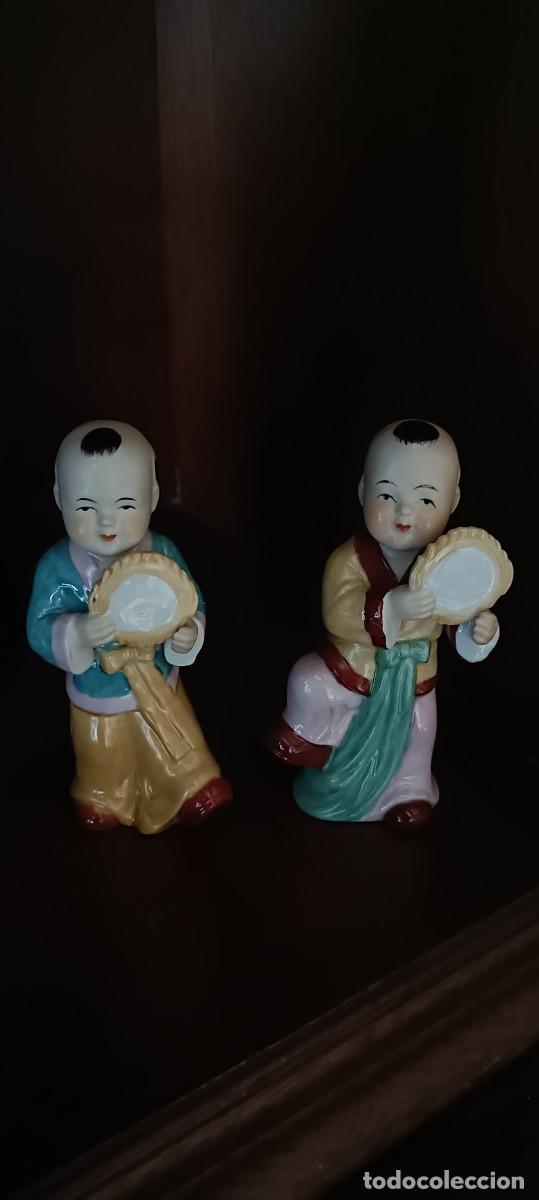Antig&uuml;edades: Pareja de ni&ntilde;os chinos tocando tambor de mano