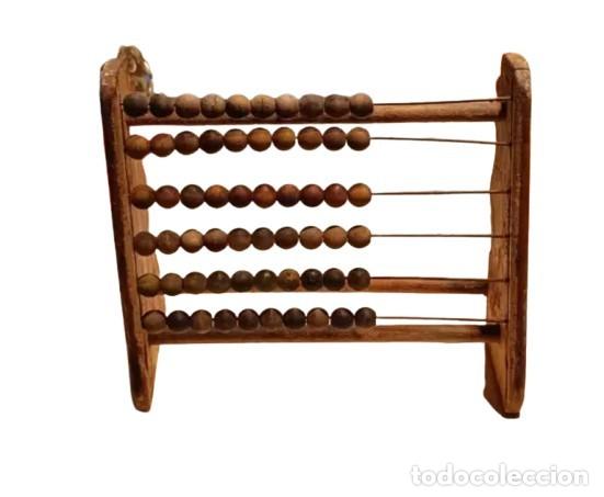 Antig&uuml;edades: &Aacute;baco infantil de madera
