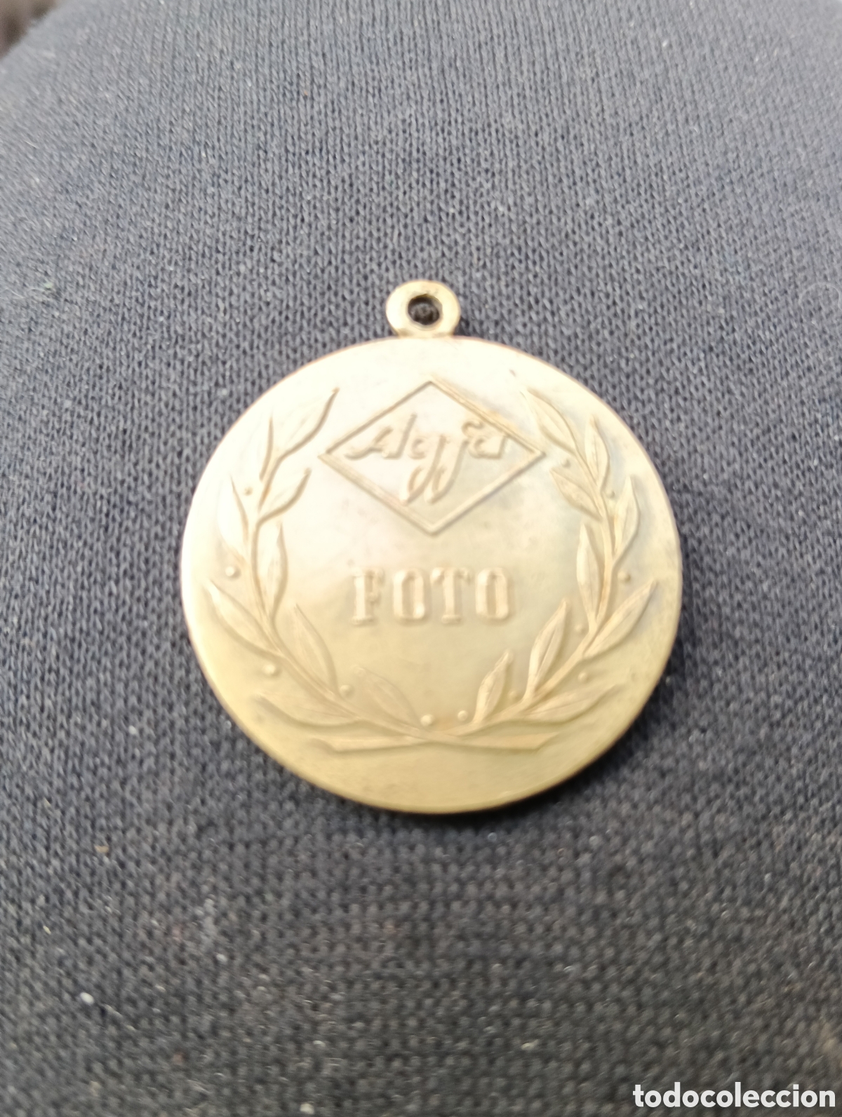 Antig&uuml;edades: Medalla de San Crist&oacute;bal con publicidad AGFA en metal