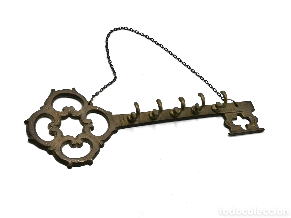 Antiquit&auml;ten: CUELGA LLAVES ANTIGUO DE BRONCE CON FORMA DE LLAVE ORNAMENTADA