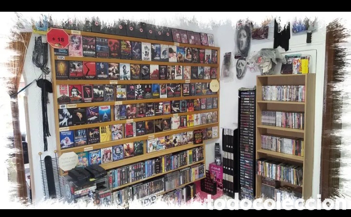 Antig&uuml;edades: Estanteria Expositora Videoclub para DVD' y VHS Mostrador para exposar unos 500 DVD's y VHS