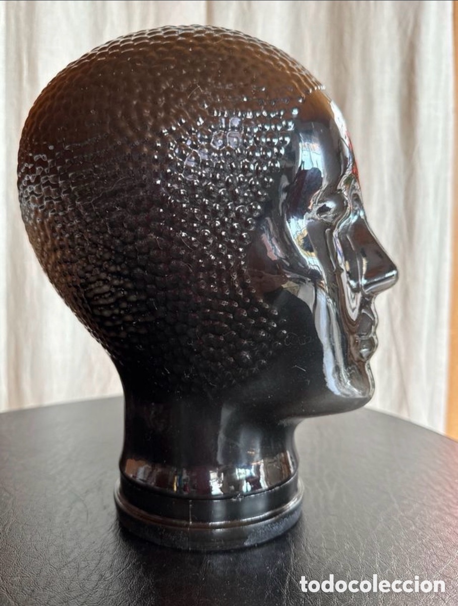 Antig&uuml;edades: Cabeza de cristal negro
