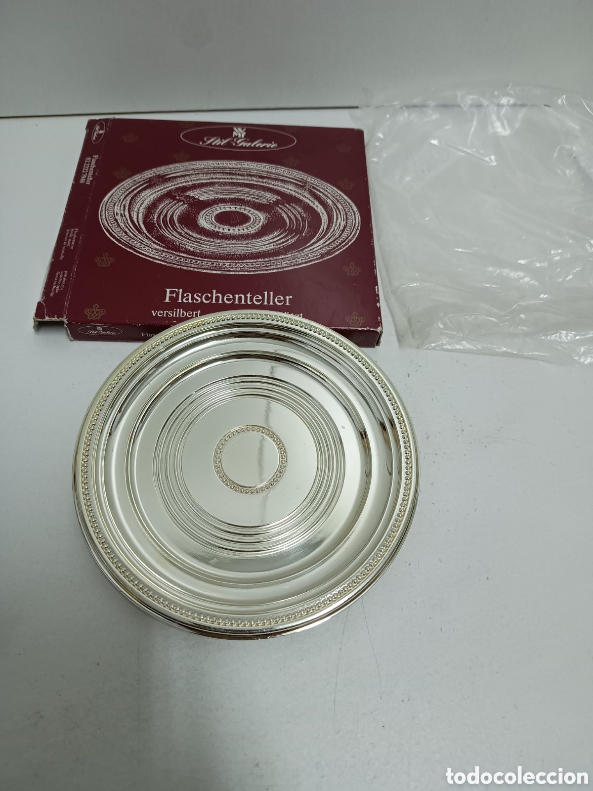 Antiquit&auml;ten: PLATO WMF FLASCHENTELLER - METAL PLATEADO - EN SU CAJA ORIGINAL - PARA APOYO DE BOTELLA - 14cm