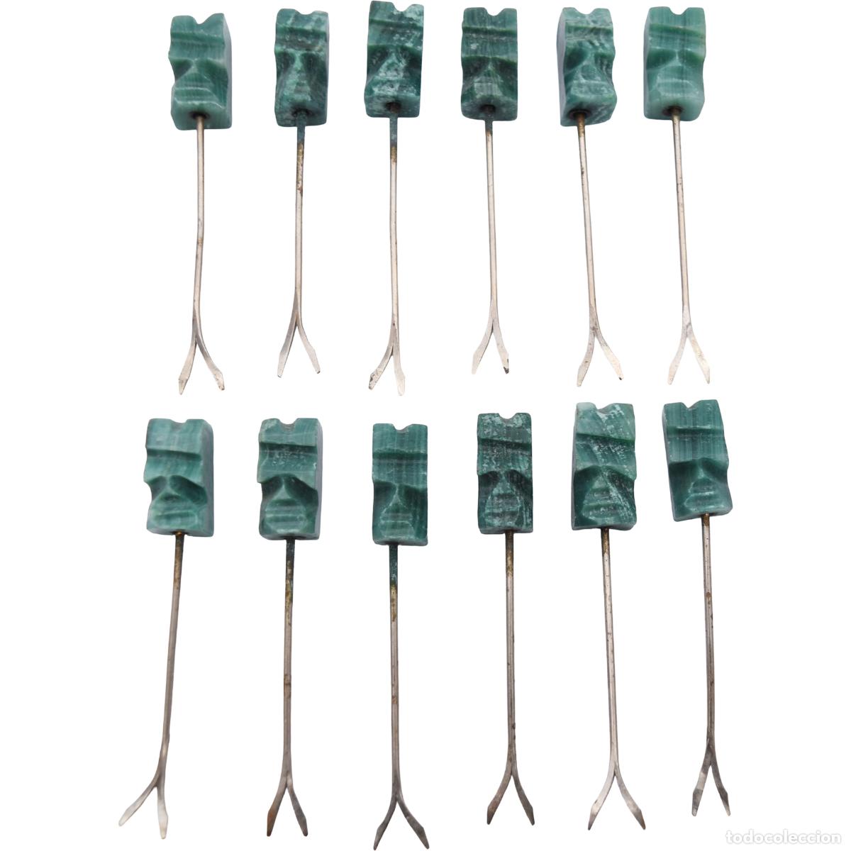 Antig&uuml;edades: Pinchos de metal con mango tallado